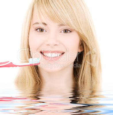 happy girl with toothbrush