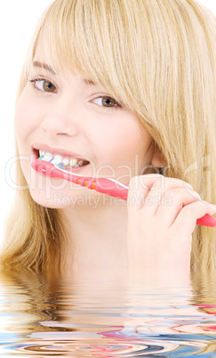 happy girl with toothbrush