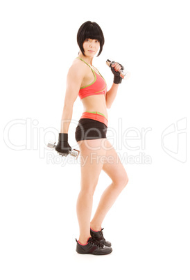 muscular fitness instructor with dumbbells