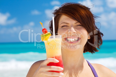 happy woman with colorful cocktail