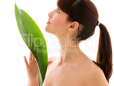 woman with green leaf