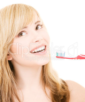 happy girl with toothbrush