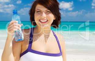 happy woman with bottle of water