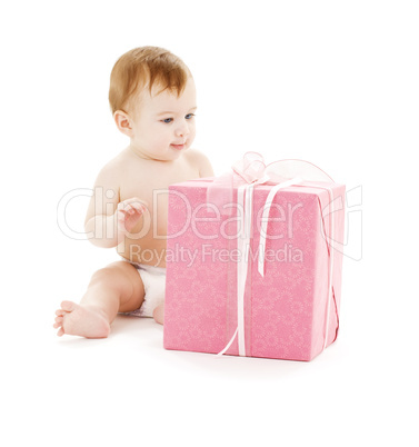 baby boy with big gift box