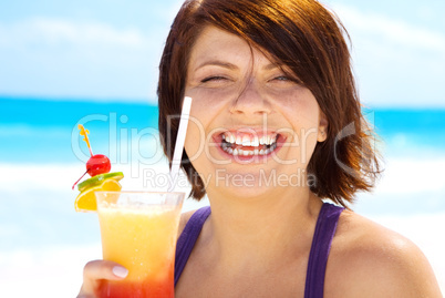 happy woman with colorful cocktail