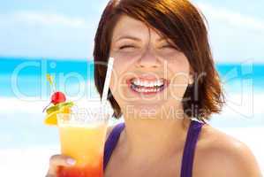 happy woman with colorful cocktail