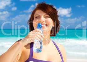 happy woman with bottle of water