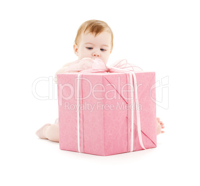 baby boy with big gift box