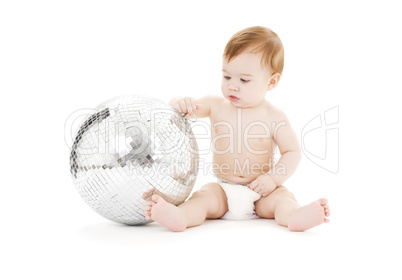 adorable baby boy with big disco ball