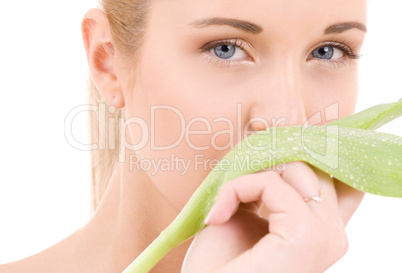 woman with green leaf