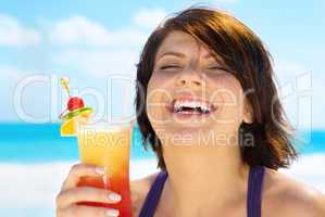 happy woman with colorful cocktail