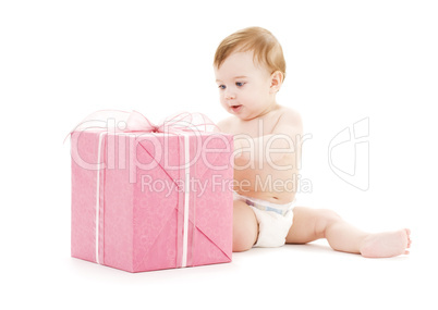 baby boy with big gift box