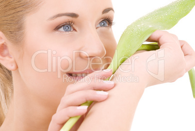 happy woman with green leaf