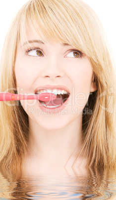 happy girl with toothbrush