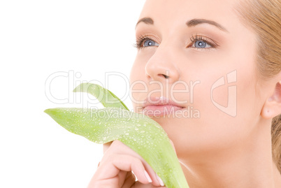 woman with green leaf