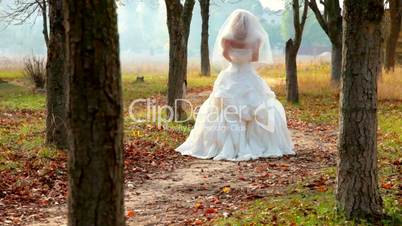 Bride in autumn park