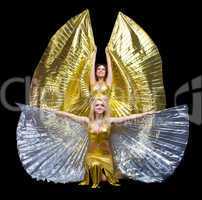 Two woman dance with wings