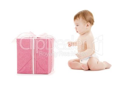 baby boy with big gift box