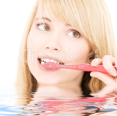 happy girl with toothbrush