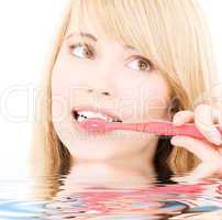 happy girl with toothbrush