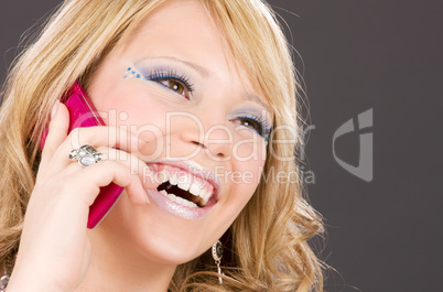 happy girl with pink phone