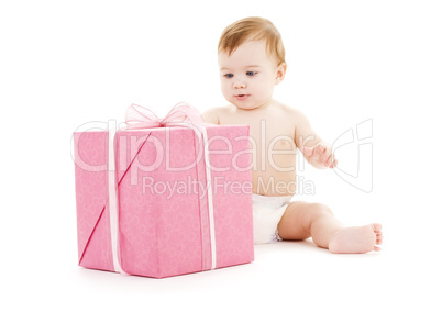 baby boy with big gift box