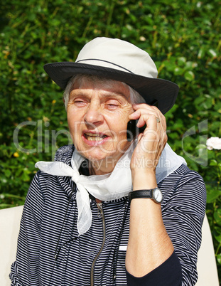 Seniorin beim Telefonieren - Senior Phone Call