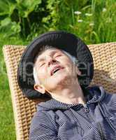 Senior relaxing in Nature - Wellness Day