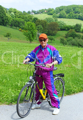 Senior beim Radfahren - Happy Senior with Bike