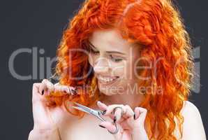redhead with scissors