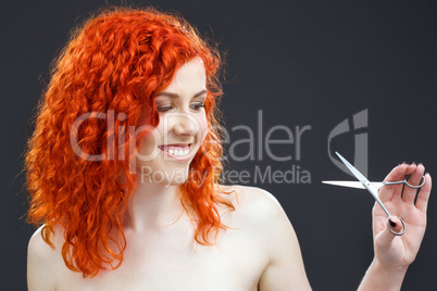 redhead with scissors