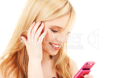 happy teenage girl with cell phone