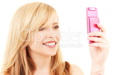 happy teenage girl with cell phone