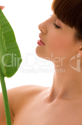 woman with green leaf