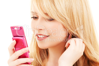 happy teenage girl with cell phone