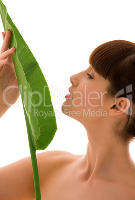 woman with green leaf