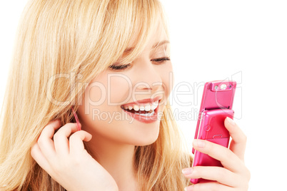 happy teenage girl with cell phone