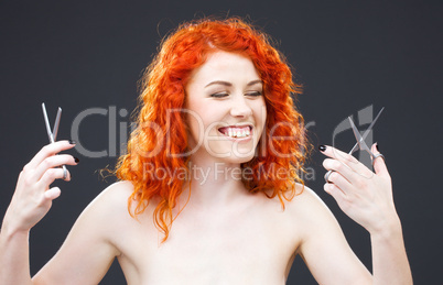 redhead with scissors