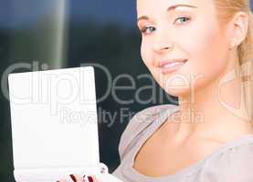 happy businesswoman with laptop computer