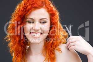 redhead with scissors
