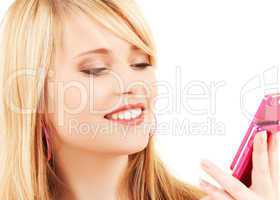 happy teenage girl with cell phone