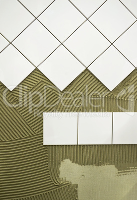 Wandfliesen kleben Wall tile glue