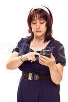 Reluctant Young Caucasian Woman Texting On Mobile Phone