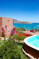 Swimming pool by luxury villa with a view on Spinalonga Island,