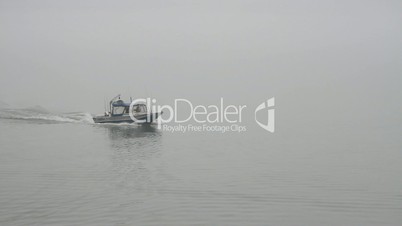 Boat crossing in fog P HD 7519