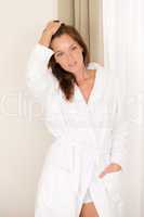 Morning bedroom - woman in bathrobe