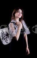 Beauty woman in lacy jacket and handbag