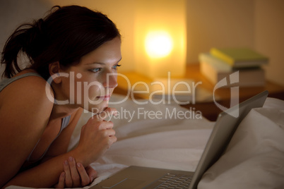 Bedroom evening - woman with laptop