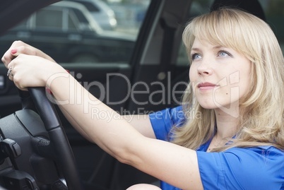 Young woman in a car