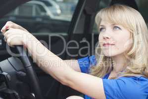 Young woman in a car